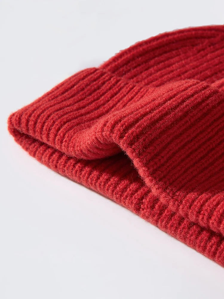 Person wearing knit beanie and scarf set