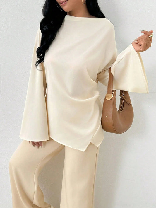 Woman layering a smart casual shirt over a base layer top