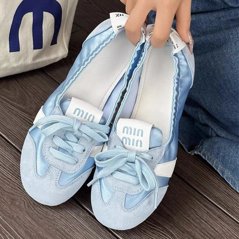 Lace-up ballet flat sneakers side view