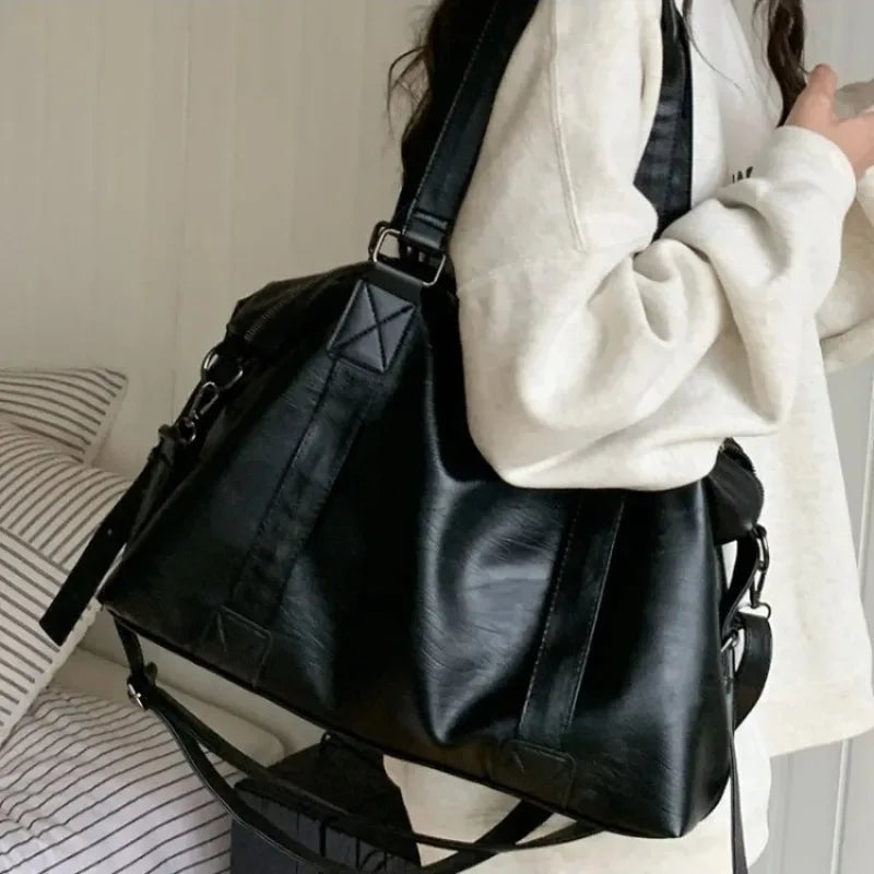 Vegan leather tote bag interior showing zip pocket