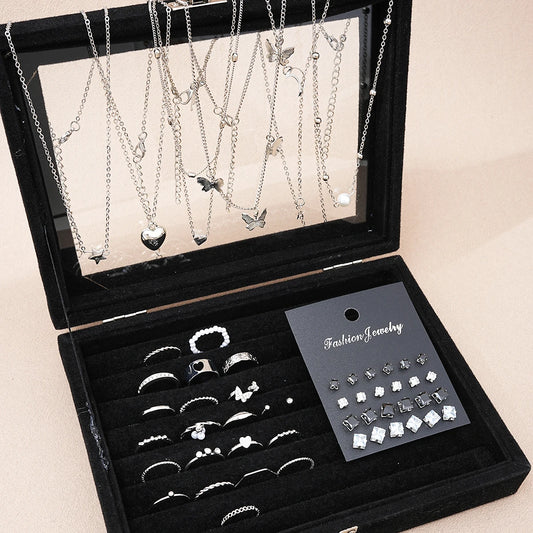 51-piece silver-tone jewelry set with necklaces, earrings, and rings