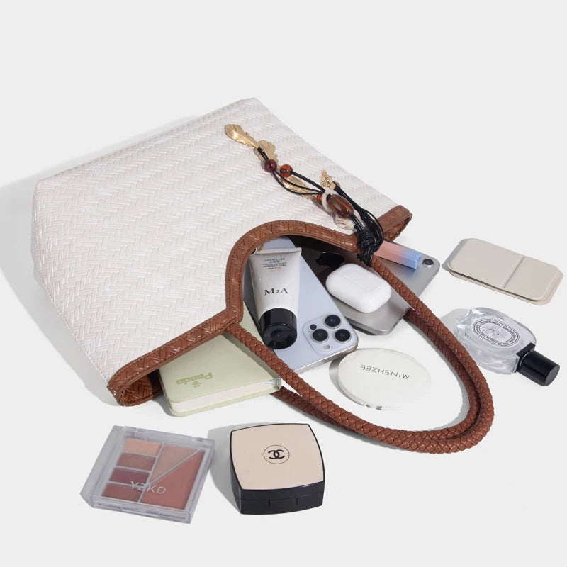 Woven tote bag carried under arm