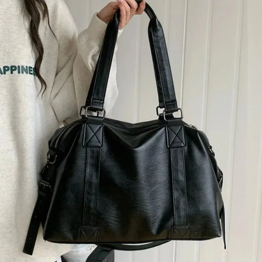 Vegan leather tote bag front view in black