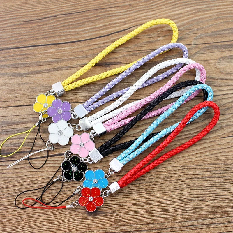 Close-up of braided cord texture on phone charm strap