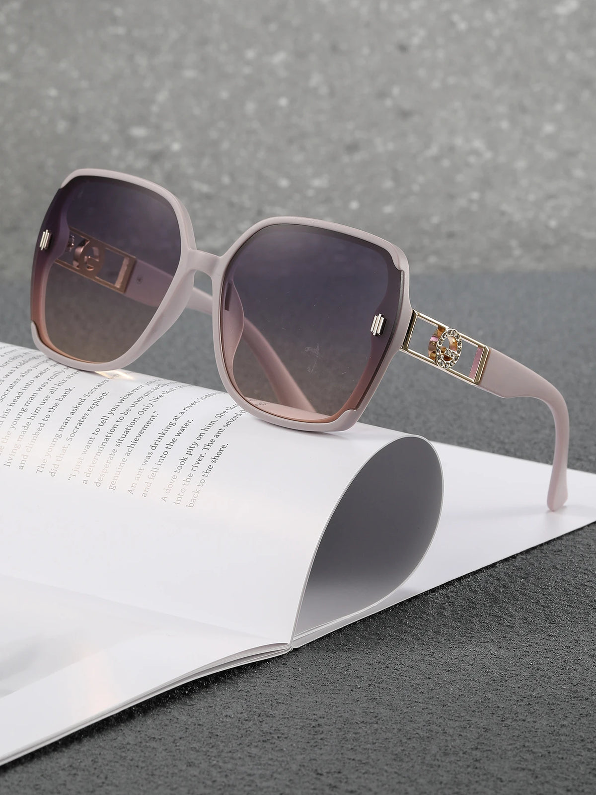 Model wearing oversized sunglasses