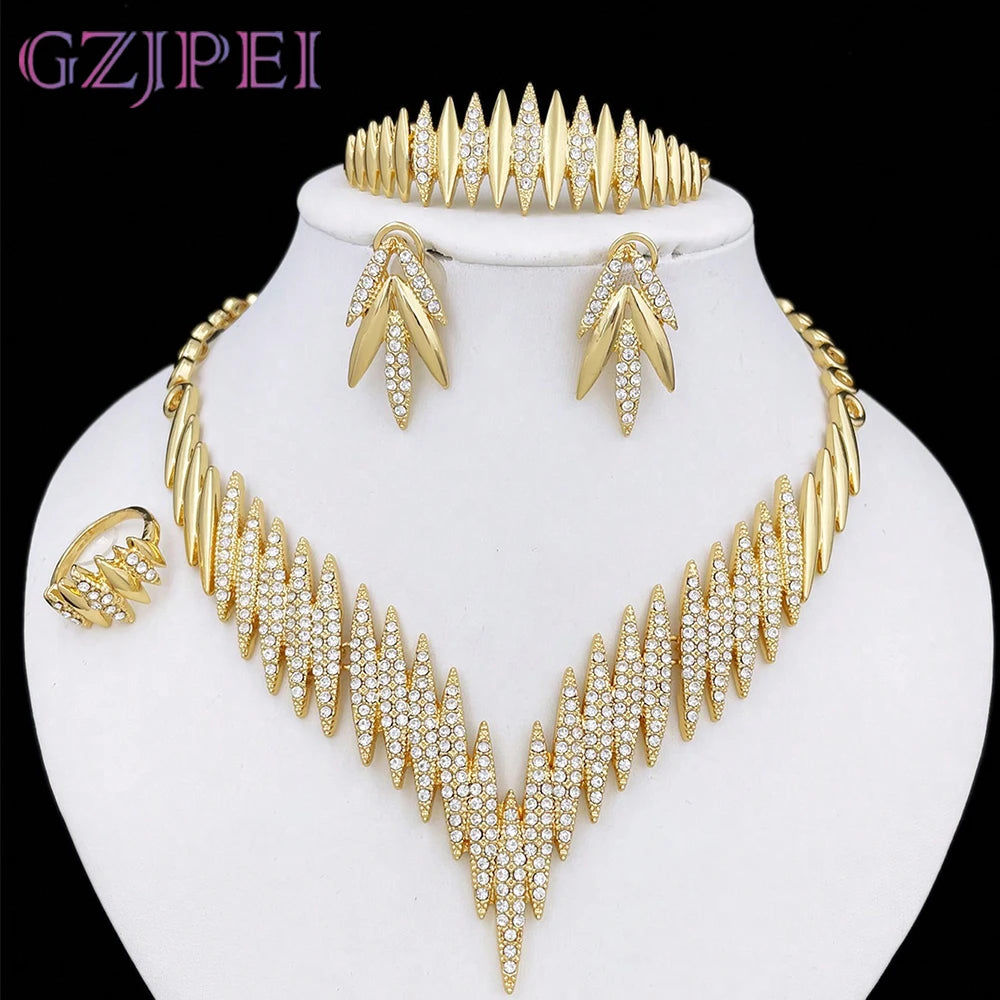 Gold-tone flower-inspired jewelry set with necklace and bracelet